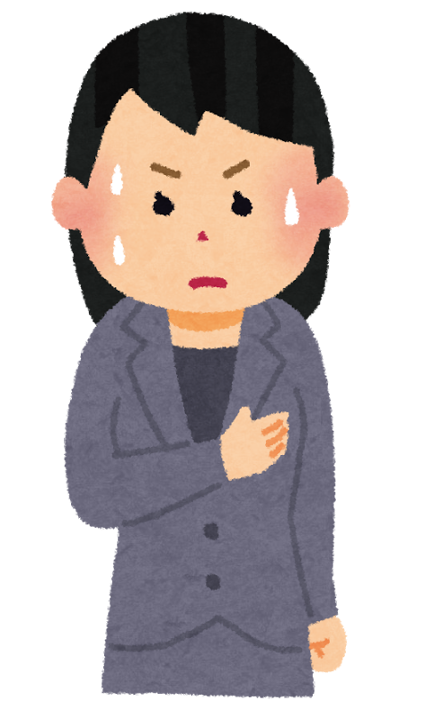 胸をおさえる女性